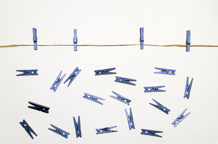 composition with a rope, small pegs for hanging the laundryの写真素材