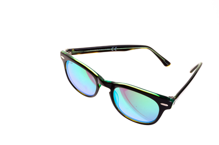 colorful sunglasses with mirrored lenses, isolated on white backgroundの写真素材