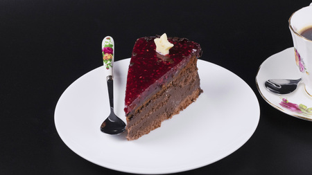 Chocolate cake with strawberry sauceの写真素材