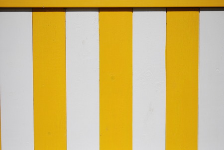 Wooden wall in yellow and whiteの写真素材