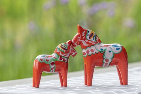 Parenting Swedish wooden horses