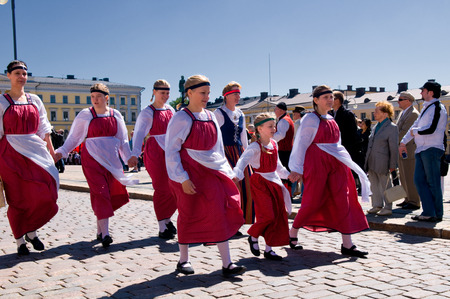 June 20, 2010. Helsinki, Finland. People taking part in the Festival of Traditional Culture. They are wearing traditional Karelian clothes.のeditorial素材