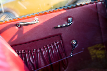 vintage car detail - red door panel