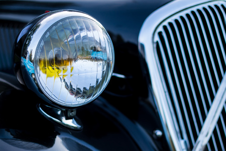 vintage car detail - headlamp grilleの写真素材