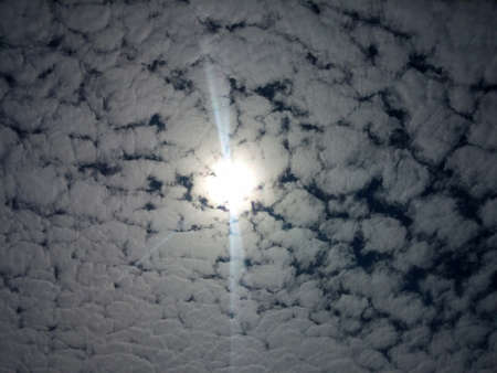 A woolly white cloud that obscured the sun