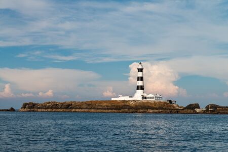 Mudouyu Lighthouse, green-level ocean, beautiful stone.の写真素材
