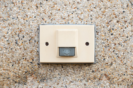 electric door bell on stone wallの写真素材