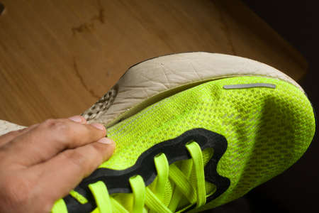 A close up shot of Outsole foam peeling shoe defectの写真素材