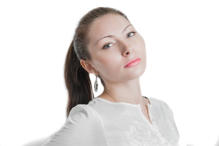 Face young beautiful girl isolated on whiteの写真素材