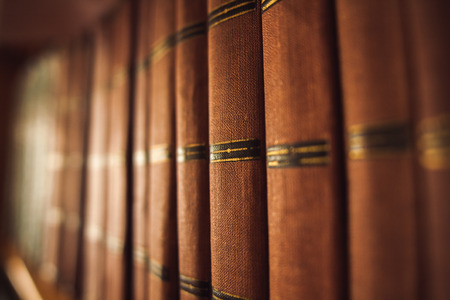old books in a old library on the bookshelfの写真素材