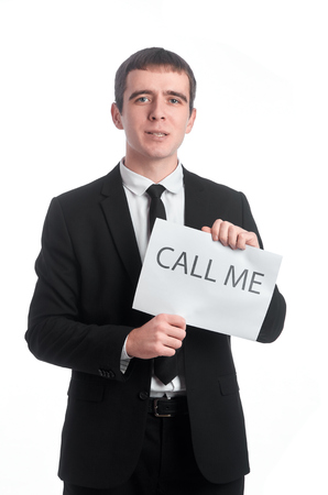 Photo of young businessman with the tablet call me in his handsの写真素材