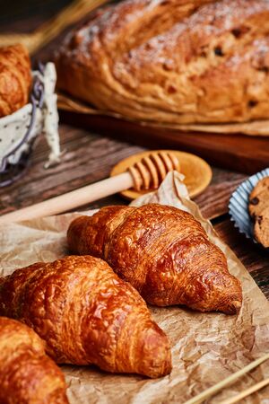 Miscellaneous delicious pastry on the wooden tableの写真素材
