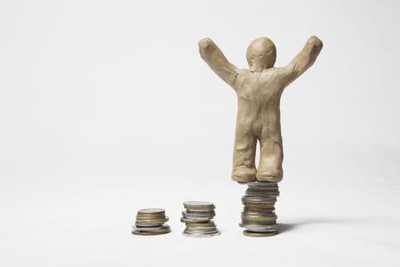 The plasticine person earns money in the various waysの写真素材