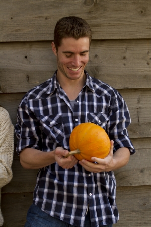 An attractive young man in the fall.の写真素材