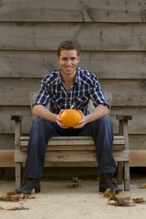 An attractive young man in the fall.の写真素材