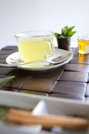 A tea scene with green tea, mint, and honey.の写真素材
