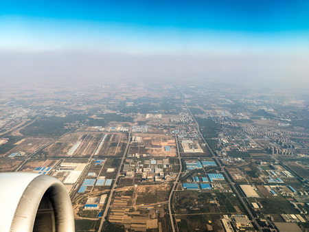Aerial view of a farmland from an airplaneの写真素材