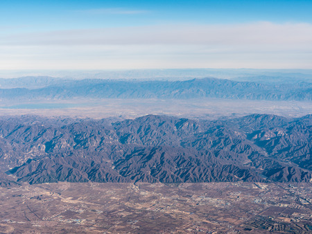 High angle view of a mountain range with buildingsの写真素材