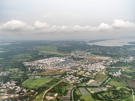 High angle view of a farmland by the seaの写真素材