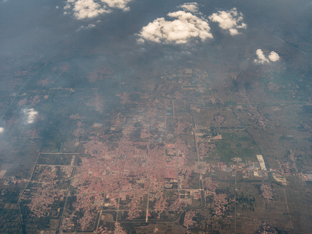 High angle view of towns and farmlandの写真素材