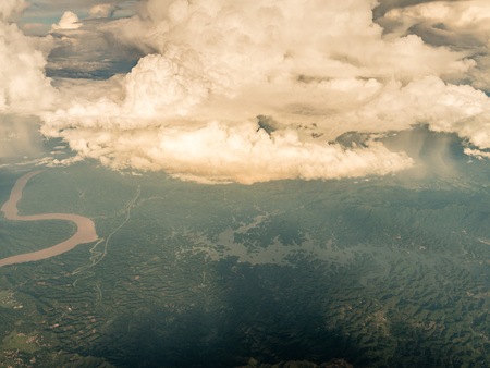 High angle view of mountain and clouds