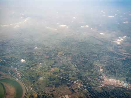 Aerial view of farmland and buildings