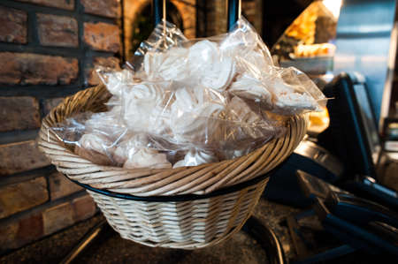 Basket of merengue desserts in a cuban restaurant.の写真素材