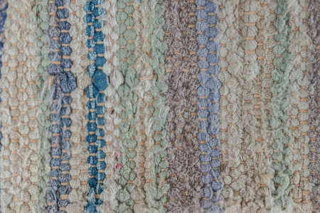 Detail of the fabrilc of an old pillowの写真素材