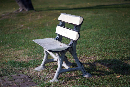 A chair on waterfront empty during spot light from sunset.の写真素材