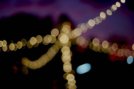 Abstract circular bokeh background of Christmaslight on the street.の写真素材