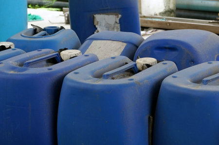 A old blue plastic canister for chemical in the factory, closeup of photo.の写真素材