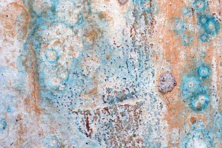 A old grunge metal texture background with rusty metal surface cracked paint caused by corrosive...