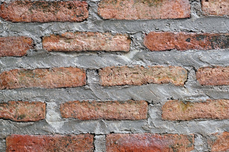 A vintage brick wall fence for texture and backgrounds.の写真素材