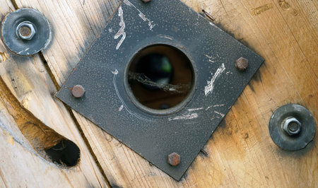 Abandoned birdhouse on a wooden background. View from above.の写真素材