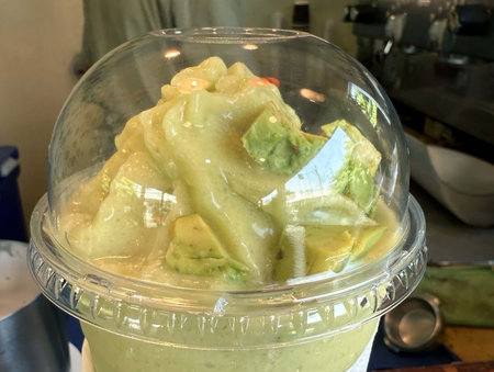 Thai dessert in a plastic cup on the tableの写真素材