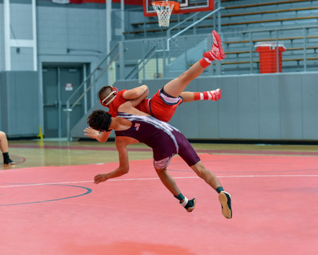 Boy wrestlers competing in a wrestling meet