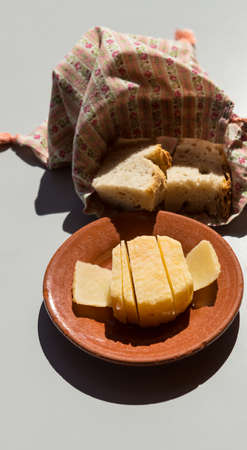Traditional cured sheep cheese and bread from Alentejo region, Portugalの写真素材