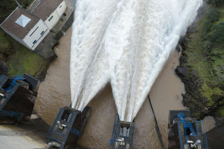 Fronhas dam discharge during the flood period, February 2021 - top viewの写真素材