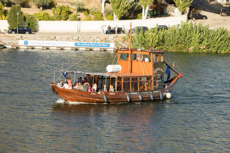 Pinhao, Portugal - 07 October 2019: Rabelo boat cruising in Douro riverのeditorial素材