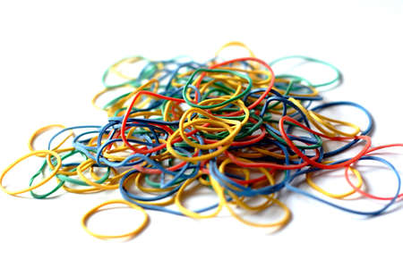 Colourful rubber bands on white backgroundの写真素材