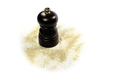 Pepper grinder with ground pepper