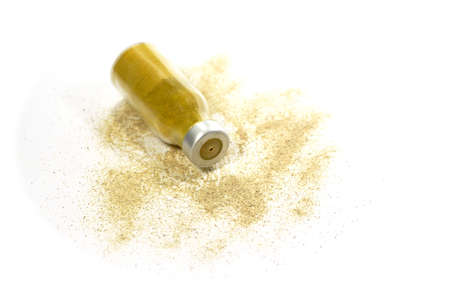 Curry in a spice glass on white background