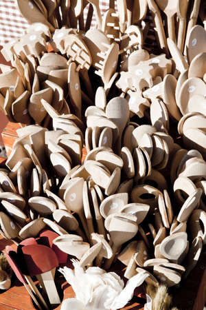 Wooden spoons on sale on marketの写真素材