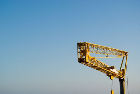 crane isolated on a blue sky.の写真素材