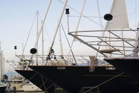 Row of extra large yacht in aportの写真素材