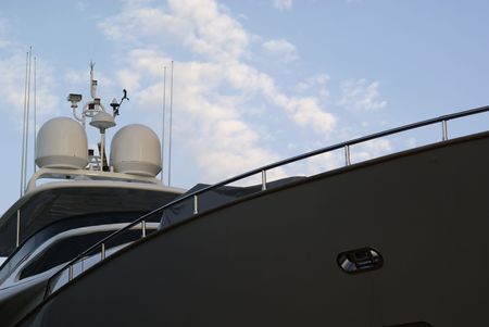 Big luxury yacht against a blue skyの写真素材