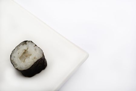 Maki roll on an elegant white plateの写真素材