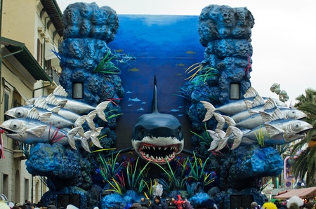 VIAREGGIO - FEB 27: Carnival float with a big shark made a papier mache at the  Carnival of Viareggio ,February 27, 2011 in Viareggio, Italyのeditorial素材