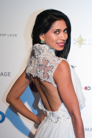CANNES, FRANCE - MAY 17: British actress and designer  Fagun Thakrar (bag by Fagun Collection) attends the "Politics Of Love" Cocktail Party on May 17, 2011 in Cannes, Franceのeditorial素材
