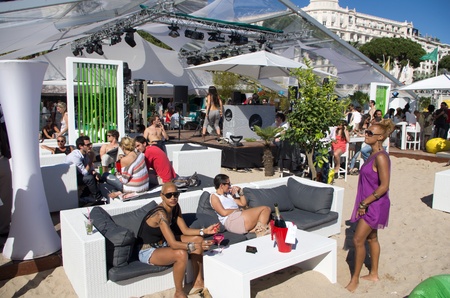 CANNES, FRANCE - MAY 16: unknown people partying in the beach of cannes during the 64th Annual Cannes Film Festival on May 16, 2011 in Cannes, France.のeditorial素材